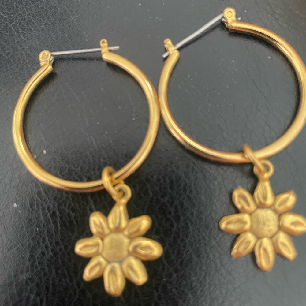 Gold classic hoop earrings with dangling flower, 2" x 1-1/4". 1 owner.